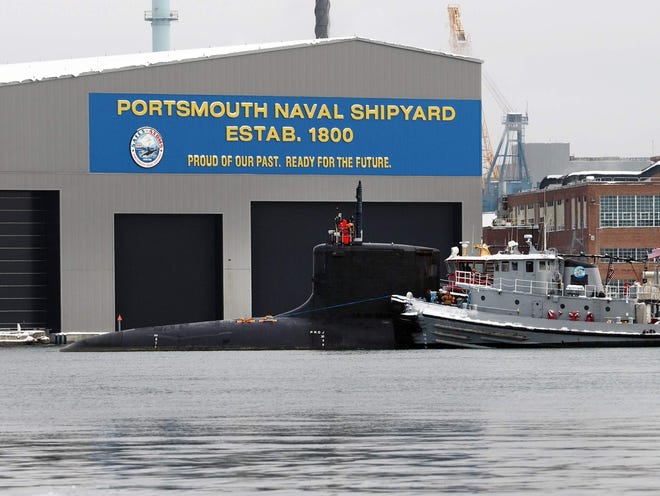 USS New Hampshire (SSN-778) arrives outside Portsmouth Naval Shipyard on Feb. 8. The Virginia class submarine was inducted into Dry Dock 2 for upgrade work. [Rich Beauchesne/Seacoastonline, file]