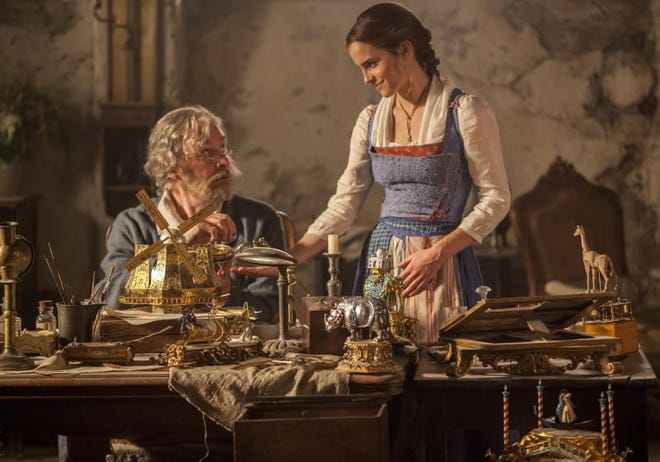 Emma Watson as Belle and Kevin Kline as Maurice star in Disney's new live-action "Beauty and the Beast."