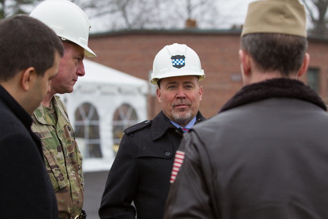 U.S. Rep. Tom MacArthur, R-7th of Toms River, listens to military personnel at the Army Reserve's 99th Regional Support Command's groundbreaking ceremony for an Army Reserve Center on the joint base on Saturday, March 18, 2017.