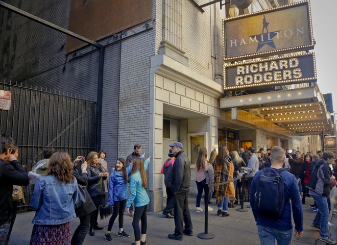 People line-up to see the Broadway play "Hamilton" in Nov. 2016, in New York.
