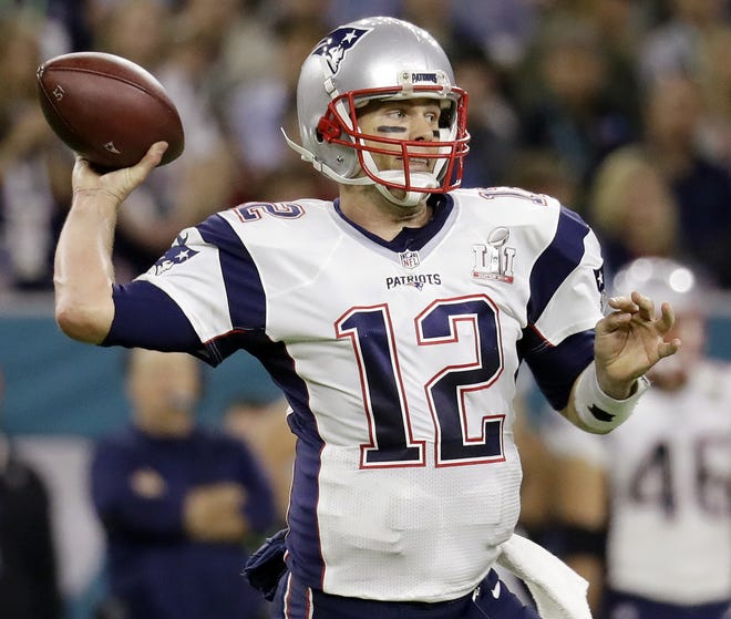 In this Feb. 5, 2017 file photo, New England Patriots quarterback Tom Brady prepares to pass against the Atlanta Falcons during the first half of the NFL Super Bowl 51 football game in Houston. THE ASSOCIATED PRESS