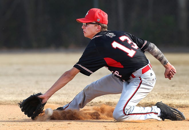 South Point second baseman Cam Hilton tries to field a ground ball during their 3-0 loss to Lake Norman Charter Tuesday. [JOHN CLARK/THE GAZETTE]