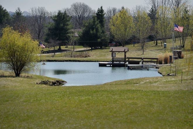 A 3-year-old boy and his twin sister girl drowned after they wandered into a Platte County pond behind their home Monday, March 20, 2017. Platte County Sheriff's Maj. Erik Holland said the 3-year-old boy was pronounced dead on the scene; a 3-year-old girl was given CPR and taken to the hospital where she later died. (Jill Toyoshiba/The Kansas City Star via AP)