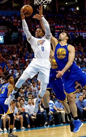 Russell Westbrook, left, hasn't sat any games this season to rest. [PHOTO BY STEVE SISNEY, THE OKLAHOMAN]