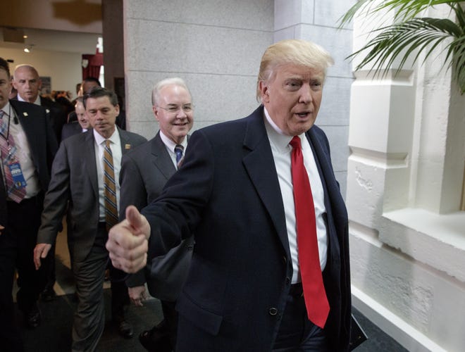 President Donald Trump and Health and Human Services Secretary Tom Price arrive on Capitol Hill in Washington, Tuesday, March 21, 2017, to rally support for the Republican health care overhaul by taking his case directly to GOP lawmakers. (AP Photo/J. Scott Applewhite)