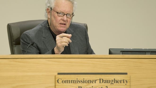 Travis County Commissioner Gerald Daughtery suggested the contract would be another way for the former purchasing agent to be compensated.