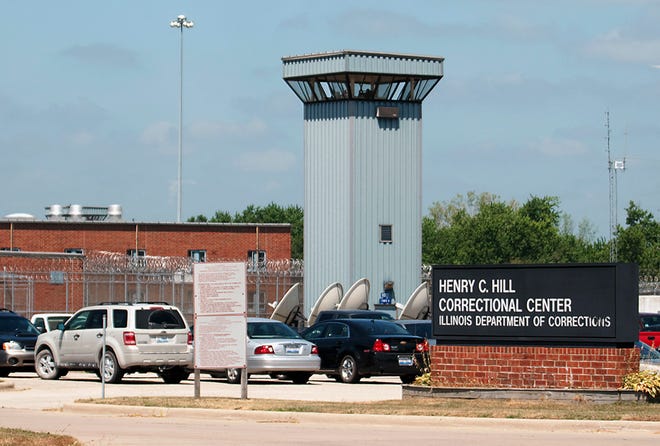 FILE - This July 25, 2011, file photo, shows the Hill Correctional Center in Galesburg, Ill. Gov. Bruce Rauner wants to replace guards in state prison watchtowers with security cameras. The Republican's budget office estimates the cost savings at $4 million in the budget year that begins July 1 2017. Corrections spokeswoman Nicole Wilson confirmed that the cameras would replace correctional officers who staff perimeter towers at minimum and medium-security facilities, but didn't have further details. (Steve Davis/The Register-Mail via AP File)