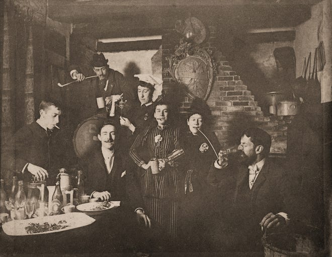 Early Providence Art Club members relax in the Cabaret Room at the club, circa 1890. The club was founded by a group of 16 people: 10 men and six women. [Courtesy of Providence Art Club]