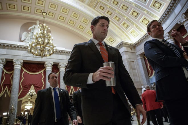 House Speaker Paul Ryan of Wis. walks to his office on Capitol Hill in Washington, Thursday, March 23, 2017, as he and the Republican leadership scramble for votes on their health care overhaul in the face of opposition from reluctant conservatives in the House Freedom Caucus. (AP Photo/J. Scott Applewhite)