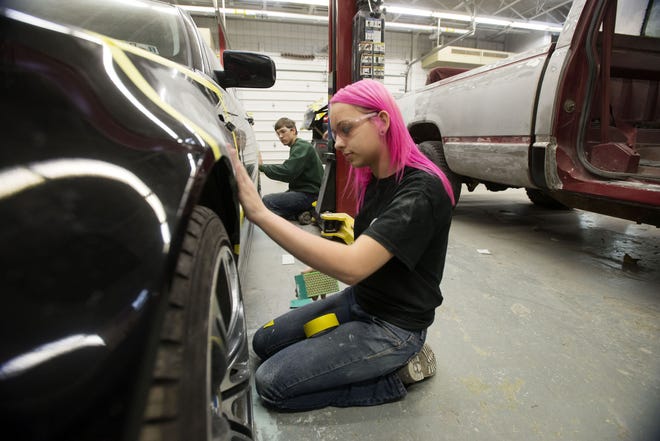 Kenna Curtis works in the auto body repair shop March 7 at Lawrence County Career and Technology Center.