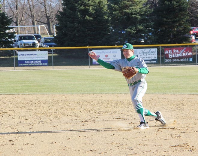 Tyler Thompson throws out a runner at first base during Geneseo’s game against Alleman. The Maple Leafs scored four runs in the bottom of the 10th inning for an 8-7 victory on March 21.