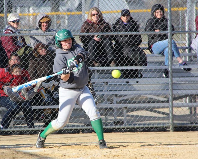 Jasmine McCormick smashes a ball to the fence during Geneseo’s victory over Dunlap at the JF Edwards Complex. The Lady Leafs won the game 17-1 in five innings on March 21.