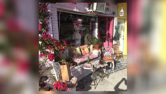The sidewalk outside Diane’s Boutique on Northwood Road features a quirky mix of colorful seating pieces, including a flower box that serves as a sofa. Photo by Brinsley Matthews, courtesy of Dorothy Draper & Co.
