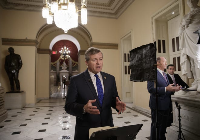 Rep. Charlie Dent, R-Pa., and a key moderate in the health care bill debate, explains why he would be voting "no" on the Obamacare replacement, Thursday, March 23, 2017, on Capitol Hill in Washington. THE ASSOCIATED PRESS