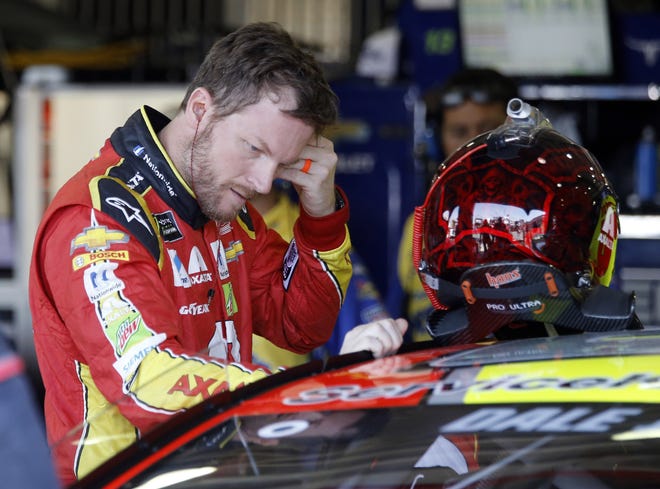Dale Earnhardt Jr. gets ready to go out for the opening practice session for the NASCAR auto race at Auto Club Speedway in Fontana, Calif. on Friday. Only 24 drivers in NASCAR history have started 600 races, and Dale Earnhardt Jr. joins the club Sunday. [ALEX GALLARDO / ASSOCIATED PRESS]