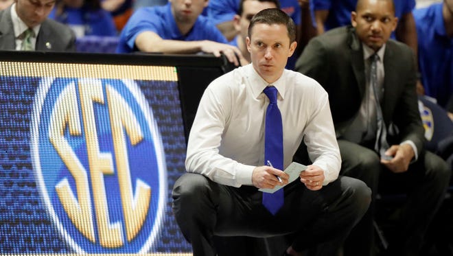 Florida head coach Mike White watches during the second half of a game against Vanderbilt on March 10 at the Southeastern Conference tournament in Nashville, Tenn. (Associated Press)