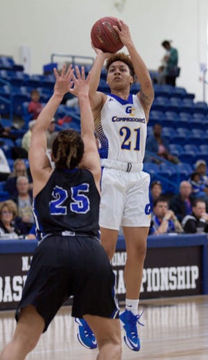 Taylor Emery (21) scored 12 of her 22 points in the fourth quarter of Gulf Coast's 80-66 win over Salt Lake in the NJCAA Division I Women's Basketball Championship on Friday night in Lubbock, Tex. [LIZ KASEY/GULF COAST PHOTO]