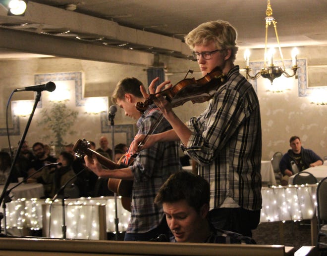 The Bratpack, comprised of Hillsdale Academy students Will Smith (on guitar), Peter Kalthoff (violin), Leo Schlueter (piano) and Greg Whalen (not pictured), opened the show at Hillsdale Idol - Unplugged. [ANDREW KING PHOTO]