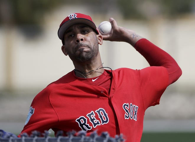 Red Sox pitcher David Price throws a live batting session at a spring training baseball workout in Fort Myers, Fla. Price will start the season on the disabled list because of his sore pitching elbow. [David Goldman/The Associated Press]
