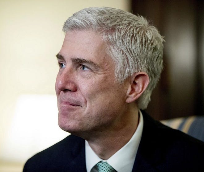 FILE - In this Tuesday, Feb. 14, 2017, file photo, Supreme Court Justice nominee Neil Gorsuch. Thirteen months after Antonin Scalia’s death created a vacancy on the Supreme Court, hearings got under way Monday, March 20, 2017, on Gorsuch, President Donald Trump’s nominee to replace him. (AP Photo/Andrew Harnik, File)