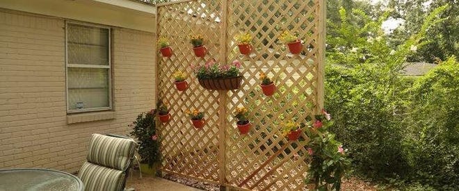Eliminate outdoor flaws with an attractive latticework fence