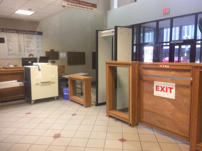 ANDY KRAVETZ/JOURNAL STAR The current screening point on Jefferson Avenue at the Peoria County Courthouse, shown here, will be closed next week because of budget constraints. People can exit but not enter there. The only entrance will be on the Main Street side.