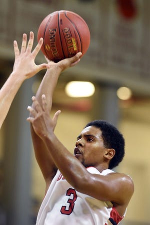 Crestview's Rusty Moorer puts up a shot last season. FILE PHOTO/DAILY NEWS