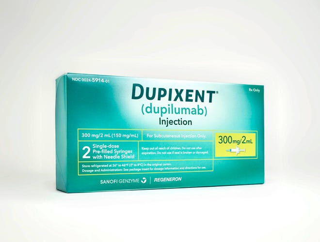 This image provided by Sanofi shows a box containing two single-dose pre-filled syringes of the drug Dupixent. On Tuesday, March 28, 2017, the Food and Drug Administration approved Dupixent for moderate or severe eczema, which causes red, fiercely itchy rashes on the face, arms and legs. (Rodrigo Cid/Sanofi via AP)