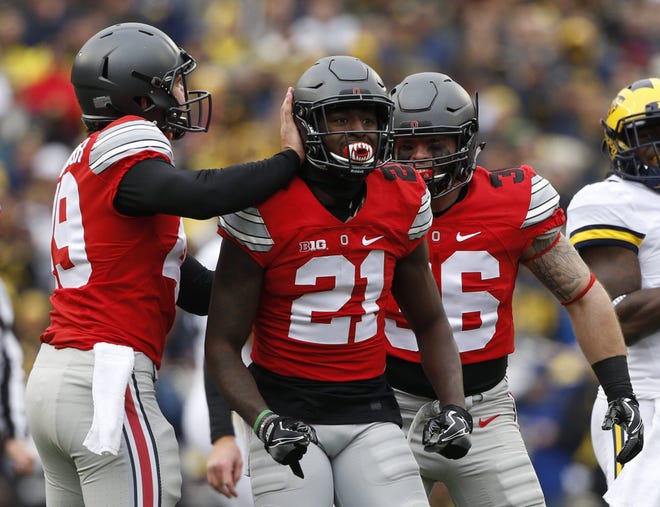 Parris Campbell, middle, has impressed coaches this spring and could land in the hybrid back spot vacated by Curtis Samuel. [Barbara J. Perenic/Dispatch]