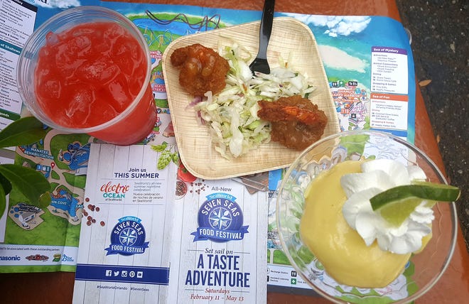 The pineapple-orange sherbet punch, coconut shrimp on swamp slaw and Key lime martini pie were among some of the samples at the Florida market at SeaWorld's Seven Seas Food Festival in Orlando. [SUBMITTED]