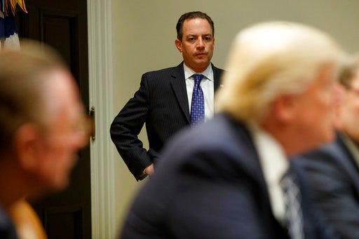 White House Chief of Staff Reince Priebus watches a meeting between President Donald Trump and the Fraternal Order of Police, Tuesday, March 28, 2017, in the Roosevelt Room of the White House in Washington. (AP Photo/Evan Vucci)