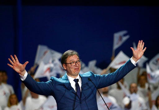 Current Serbian Prime Minister and presidential candidate Aleksandar Vucic waves to his supporters during a pre-election rally, in Belgrade, Serbia, Friday, March 24, 2017. Vucic, a former ultranationalist now European Union supporter, is a clear favorite to win against several fragmented opposition candidates. He is looking to get enough votes to avoid runoff election on April 16 which would put him in a much trickier position against a single opposition candidate. (AP Photo/Darko Vojinovic)