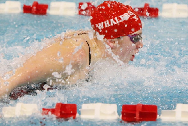 New Bedford's Kyleigh Barao heads for home in a splash of water. MIKE VALERI/THE STANDARD-TIMES/SCMG