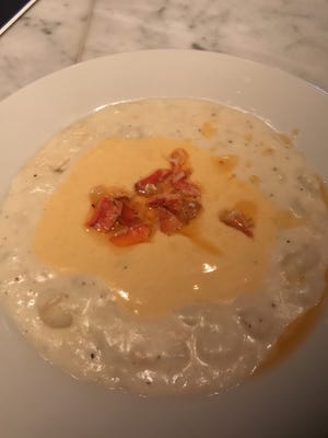 The Nobody’s Favorite, Currents' award-winning Seafood Chowder with their chunky Lobster Bisque, floating in the middle of it. The two don't mix so you get the best of both worlds. [Photo by Rachel Forrest]