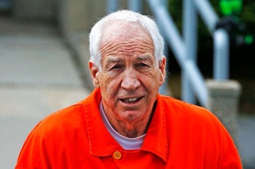 FILE - In this Monday, May 2, 2016, file photo, former Penn State University assistant football coach Jerry Sandusky leaves the Centre County Courthouse after a hearing of arguments on his request for an evidentiary hearing as he seeks a new trial in Bellefonte, Pa. A Penn State trustee says he's "running out of sympathy" for "so-called victims" of Sandusky following the conviction of a former Penn State president over his handling of a 2001 complaint about Sandusky. The comments by Al Lord were reported Thursday, March 30, 2017, by The Chronicle of Higher Education. (AP Photo/Gene J. Puskar, File)