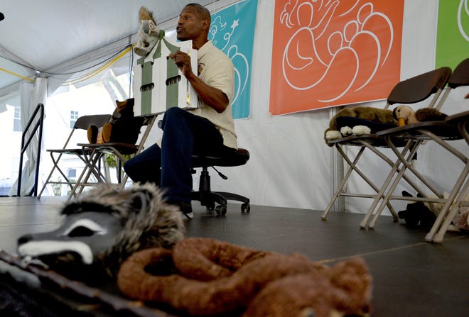 Windell Campbell leads the Storytelling with Puppets workshop during the Florida Storytelling Festival on Friday in Mount Dora. The event celebrates orators with workshops, concerts and opportunities to hear and share stories. [AMBER RICCINTO / DAILY COMMERCIAL]