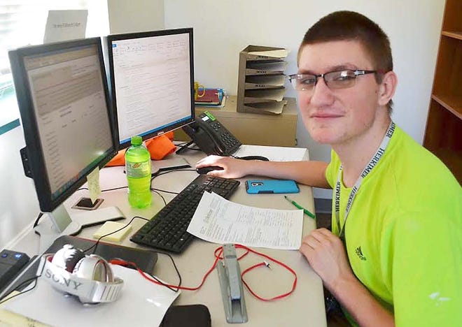 Dakotah Dunham, a 2016-17 Project Search intern, works on overseeing an equipment usage calendar as part of his responsibilities working in Herkimer College’s Information Services: RTV and AV department. Dunham is part of a one-year Arc Herkimer and Herkimer College intern program, Project SEARCH, which gives participants marketable skills for competitive employment upon graduation.      

[Photo Submitted]