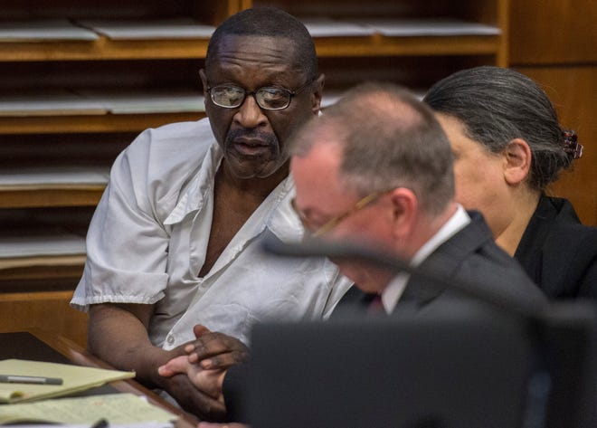 FRED ZWICKY/JOURNAL STAR

Cleve Heidelberg, 73, shakes hands with his defense attorney Andy Hale after he finished making his argument outlining his case for Cleve Heidelberg as Judge Albert Purham Jr. listens to closing arguments in the post-conviction hearing for Heidelberg, 73, who was convicted of the murder of Peoria County Sheriff's Sgt. Raymond Espinoza on May 26, 1970. Heidelberg, 73, has been in custody since the day of the killing of Espinoza, who was responding to a report of an attempted armed robbery at the Bellevue Drive-In Theater.