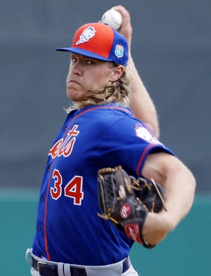 Noah Syndergaard of the Mets is among the new wave of pitchers to regularly hit faster than 100 mph with his pitches, but some are starting to question the long-term health effects of throwing so hard. [AP Photo/Brynn Anderson, File]