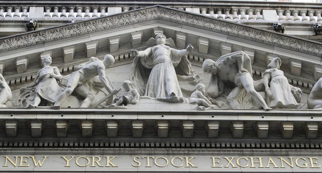This Oct. 18, 2016, file photo shows the New York Stock Exchange building in New York.  European stock markets traded in narrow ranges Friday, March 31, 2017, though trading has the potential to become quite volatile in the hours before the first quarter of the year ends.. THE ASSOCIATED PRESS