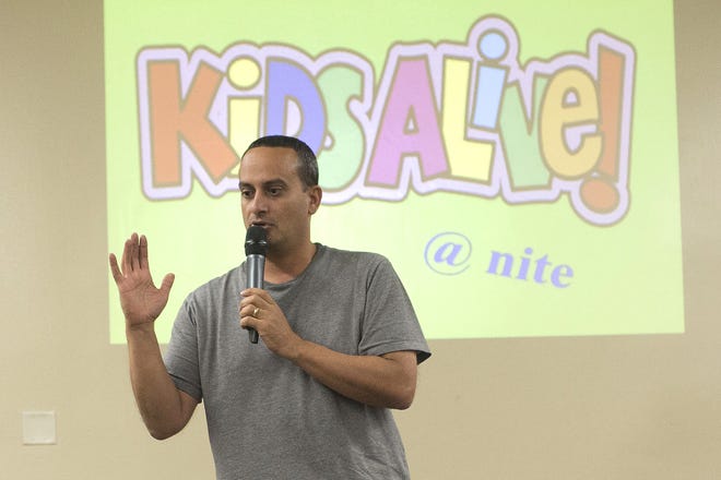 Children's Pastor Mark LoGiudice talks about faith after hearing the Bible story of Peter walking on the water with Jesus at Kids Alive on Wednesda at Life Church Assembly of God in Fruitland Park. [CINDY DIAN / CORRESPONDENT]