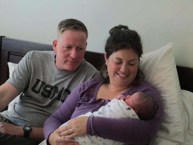 New baby boy - Charles Roger Blitch - born at 11:08 a.m., March 24, 2017, mere hours before was born in the very same birth room as his two siblings at The Midwife Group and Birth Center to Carmen and Jeremiah Blitch of Statesboro. Jill Whitfield, one of the Birth Center's most experienced Certified Nurse Midwifes "caught" the baby, her second for the family. (Photo by T. Wayne Waters)