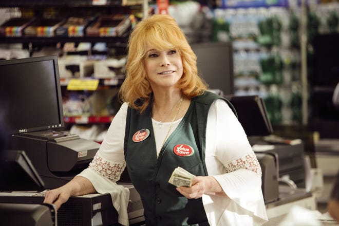 Ann-Margret plays a sexy cashier with a thing for Alan Arkin in "Going in Style." [WARNER BROS.]