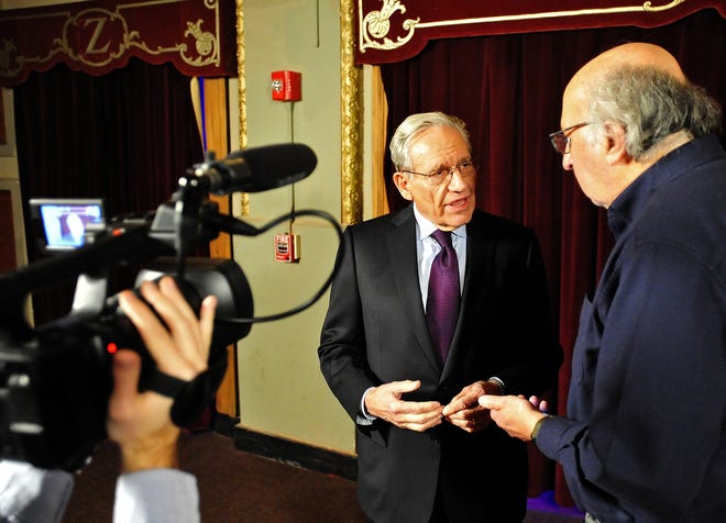 Washington Post journalist and author Bob Woodward speaks with Standard-Times reporter Steve Urbon before ths start of his talk Saturday night at the Zeiterion Theater in New Bedford. [DAVID W. OLIVEIRA/STANDARD-TIMES SPECIAL/SCMG]