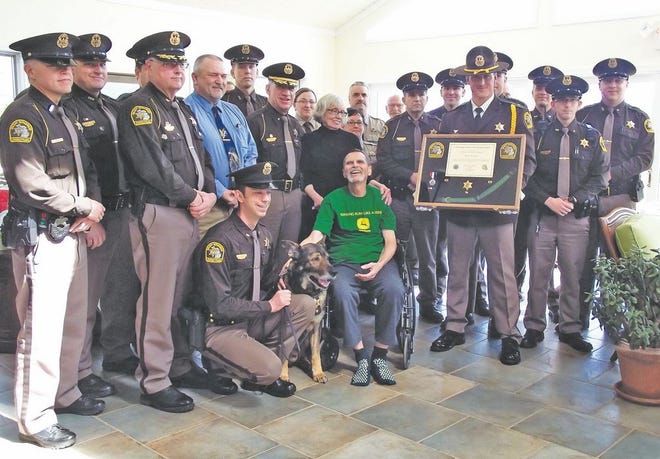 The Cheboygan County Sheriff's Department presented K9 Taser with a plaque of appreciation for his 10 years of service to the department at a retirement ceremony held at the Hospice House in Cheboygan. The ceremony was moved up after Cheboygan County Board of Commissioners Chair Tony Matelski was diagnosed with terminal cancer. Without the help of Matelski and his wife Roberta, the department would have never been able to have a K9 unit.