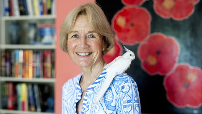 Pamela Acheson Myers wrote her new book, “Palm Beach: A Complete Guide to the Island” while her cockatiel Blanco sat on her shoulder. (Meghan McCarthy / Daily News)