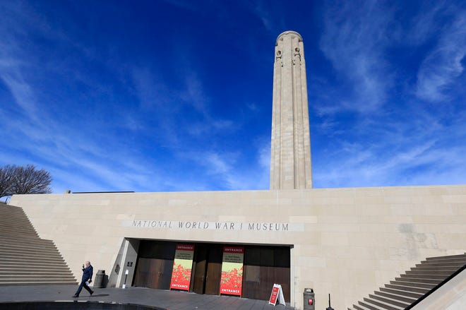 In Feb. 16, 2017 photo a visitor leaves the National World War I Museum in Kansas City, Mo. (AP Photo/Orlin Wagner)