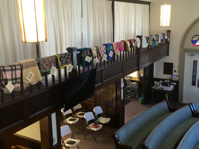 SUBMITTED PHOTO

Prayer shawls hang from the rafters at Midvale United Methodist Church.