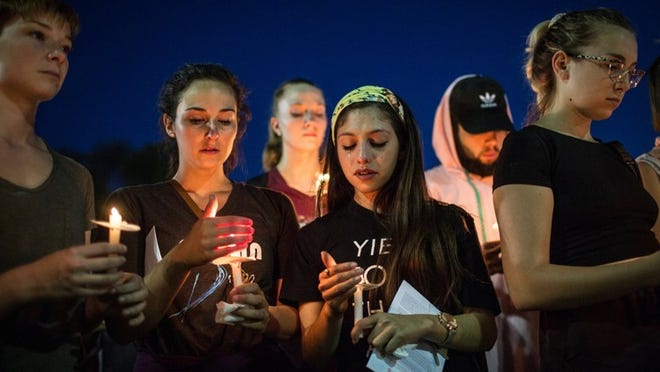 Members of the UT community gather for a public memorial ceremony Monday on the university’s Main Mall in remembrance of dance freshman Haruka Weiser, who was killed on campus one year ago. TAMIR KALIFA/ AMERICAN-STATESMAN