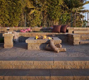 Outdoor living space located in Pismo Beach, CA designed by Addison Landscape, includes an Patio, Firepit and Steps. The project utilized the following Belgard products manufactured by Sierra Building Materials of Fontana, CA Mega Arbel - Toscana Celtik - Toscana